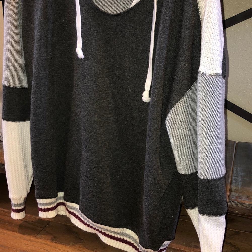 grey and white sweater